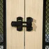 A close-up view of a black latch on a light wood surface, with a wire mesh visible on the left and right edges. Náhled obrázku produktu