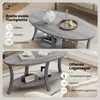 A split image showing a gray oval coffee table with items on it and text overlays describing its features. Produktbild-Vorschau