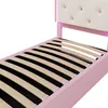 Close-up of a pink bed frame with a white upholstered headboard. Produktbild-Vorschau