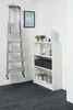 A storage area with a ladder, a bookshelf, and carpet tiles. Produktbild-Vorschau