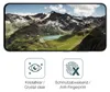 A smartphone screen displaying a mountain landscape, with icons and text below indicating product features. Podgląd zdjęcia produktu