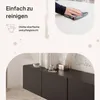 A close-up of a hand cleaning a surface, with a product image below. Voir les images du produit