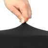 A hand is stretching a piece of black fabric. Anteprima dell’immagine prodotto