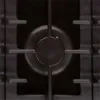 A close-up view of a gas stove burner. Produktbild-Vorschau