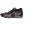 A side view of a single gray and black shoe against a white background. Produktbild-Vorschau