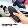 A person is holding a remote control in front of a TV screen displaying a whale. Anteprima dell’immagine prodotto
