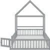 A grey wooden house-shaped bed frame with a fence-like railing and an open gate. Náhľad obrázku produktu