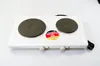 A white electric double hot plate with a "Made in Germany" sticker on it, placed on a white surface. Náhľad obrázku produktu