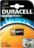 The image shows the packaging of Duracell Ultra Photo lithium batteries, with a single battery and a digital camera depicted. Voir les images du produit