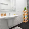 A bathroom scene with a sink, mirror, and a wooden corner shelf. Podgląd zdjęcia produktu