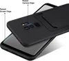 A black phone case is shown from a diagonal angle, with a phone underneath it. Produktbild-Vorschau