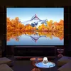 A home theater setup with a large screen displaying a mountain landscape, a media console, and seating. Náhled obrázku produktu