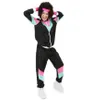 A woman wearing an 80s-style tracksuit and afro wig poses against a white background. Produktbild-Vorschau