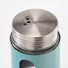 Close-up of the top of a teal spice shaker with a silver metal lid. Podgląd zdjęcia produktu