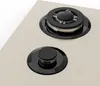 A close-up view of a gas stovetop with two burners and a control knob. Náhľad obrázku produktu