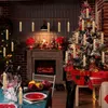 A festive Christmas scene with a decorated tree, fireplace, and a set dining table, illuminated by candle-like lights. Produktbild-Vorschau