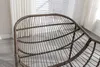 Close-up view of a brown wicker chair. Náhled obrázku produktu