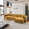 A modern living room with a large sectional sofa, coffee table, and abstract rug. Produktbild-Vorschau
