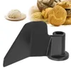 A black bread maker paddle is shown in the foreground, with a collage of baked goods and dough in the background. Produktbild-Vorschau