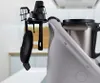 A close-up view of a kitchen appliance accessory organizer attached to a white kitchen appliance. Produktbild-Vorschau