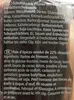 A close-up of a food product's packaging, showing ingredient and nutritional information in German and French. Produktbild-Vorschau