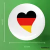 Huuraa Button Deutschland Flagge Herz 25mm rund mit Produktbild-Vorschau 3