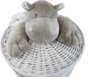 A plush toy hippo sits on top of a white wicker laundry basket. Náhľad obrázku produktu