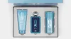 A gift set of three fragrance products, including a shower gel, perfume, and deodorant, arranged in a box. Voir les images du produit