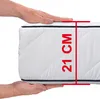 A hand is shown pressing down on a mattress to demonstrate its thickness, with a red measurement graphic indicating 21 cm. Produktbild-Vorschau