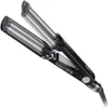 A black and silver curling iron is shown against a white background. Náhľad obrázku produktu