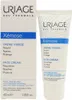 A product shot of Uriage Xémose Face Cream and its packaging. Produktbild-Vorschau