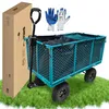 A teal garden wagon with a black liner and handle, a cardboard box, and a pair of gloves, all placed on a patch of green grass. Voir les images du produit