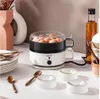 A kitchen scene with an egg cooker, vases, and tableware. Voir les images du produit