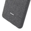 A close-up view of a grey textured phone case with the Huawei logo. Produktbild-Vorschau