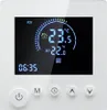 A white digital thermostat with a black LCD screen displaying temperature and time. Voir les images du produit