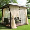 A gazebo with sheer curtains and outdoor furniture set up in a garden. Náhled obrázku produktu