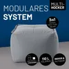 A grey modular ottoman is shown against a blue background with marketing text and icons. Produktbild-Vorschau