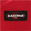 A close-up of a red fabric with a black label featuring the Eastpak logo and text. Anteprima dell’immagine prodotto