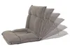 A gray floor chair shown in multiple reclining positions. Produktbild-Vorschau