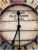 A close-up of a vintage-style wall clock face. Anteprima dell’immagine prodotto