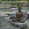 A Buddha statue is placed on rocks in a garden pond, with text overlays describing it as an eye-catcher. Náhľad obrázku produktu