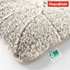 A close-up view of a fluffy bath mat with a leaf pattern. Anteprima dell’immagine prodotto