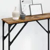 A close-up view of a console table with decorative items on top. Náhled obrázku produktu