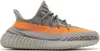A side view of a Yeezy Boost 350 V2 Beluga Reflective sneaker against a white background. Produktbild-Vorschau
