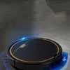 A black robot vacuum cleaner with a gold accent is cleaning a dark gray floor. Anteprima dell’immagine prodotto