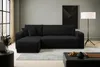 A modern living room scene featuring a black sectional sofa. Voir les images du produit