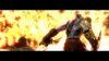 A character from God of War 3 is shown from behind, holding weapons, with a large explosion in the background. Produktbild-Vorschau