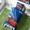 A child's bed with Cars-themed bedding is shown in a bedroom setting. Podgląd zdjęcia produktu