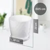 A white textured plant pot with a saucer, shown with measurement overlays indicating its dimensions. Podgląd zdjęcia produktu