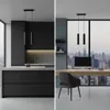 A split image showing a modern kitchen on the left and a home office with a city view on the right. Náhled obrázku produktu